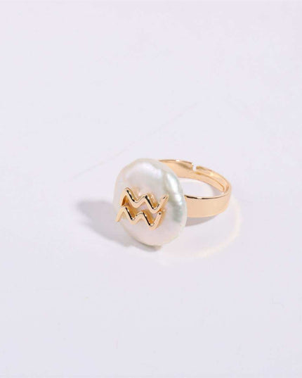 Cosmic Constellation Ring – Celestial star sign jewelry with gold accents.