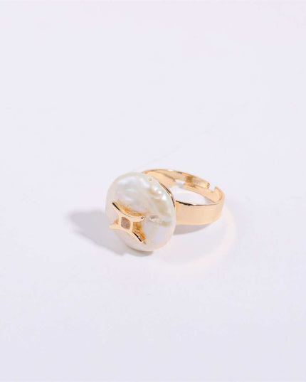 Cosmic Constellation Ring with celestial star sign design on a gold band.