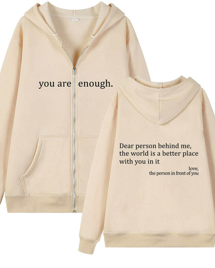 Plus size beige hoodie with motivational text, zipper, and drawstring design.