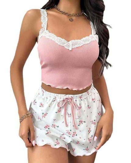 Ladies' homewear lace suspender shorts suit in pink, featuring a sleeveless design with a lace-trimmed top and floral shorts.