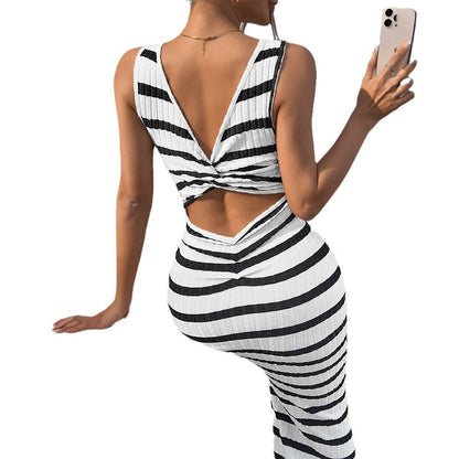 Women's Fashion Temperament Leisure Slim Striped Sleeveless DressStep out in style with the Women's Fashion Temperament Leisure Slim Striped Sleeveless Dress from Plush Fashions Shop Vintage Summer Spice. This elegant dress featurDressPlush Fashions ShopPlush Fashion Shop