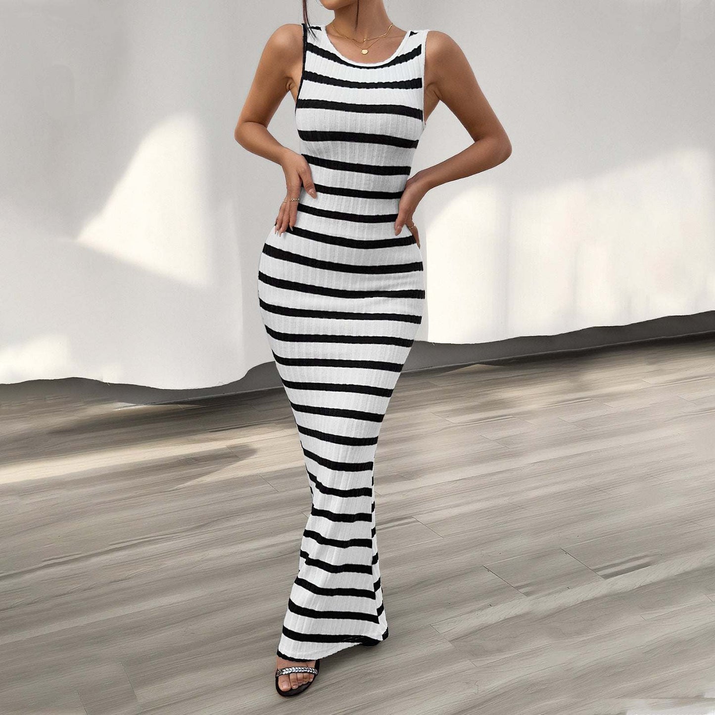 Women's Fashion Temperament Leisure Slim Striped Sleeveless DressStep out in style with the Women's Fashion Temperament Leisure Slim Striped Sleeveless Dress from Plush Fashions Shop Vintage Summer Spice. This elegant dress featurDressPlush Fashions ShopPlush Fashion Shop