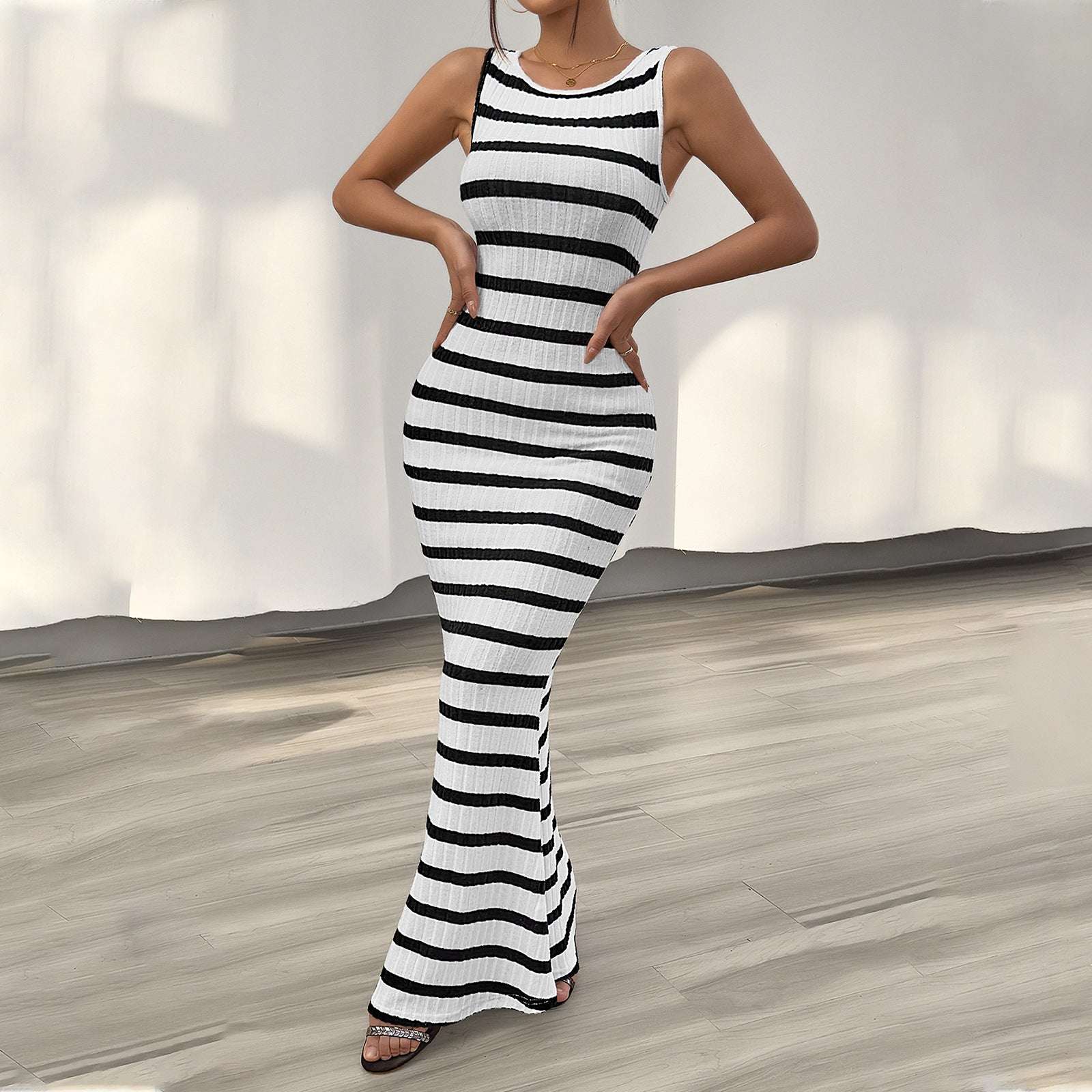 Women's Fashion Temperament Leisure Slim Striped Sleeveless DressStep out in style with the Women's Fashion Temperament Leisure Slim Striped Sleeveless Dress from Plush Fashions Shop Vintage Summer Spice. This elegant dress featurDressPlush Fashions ShopPlush Fashion Shop