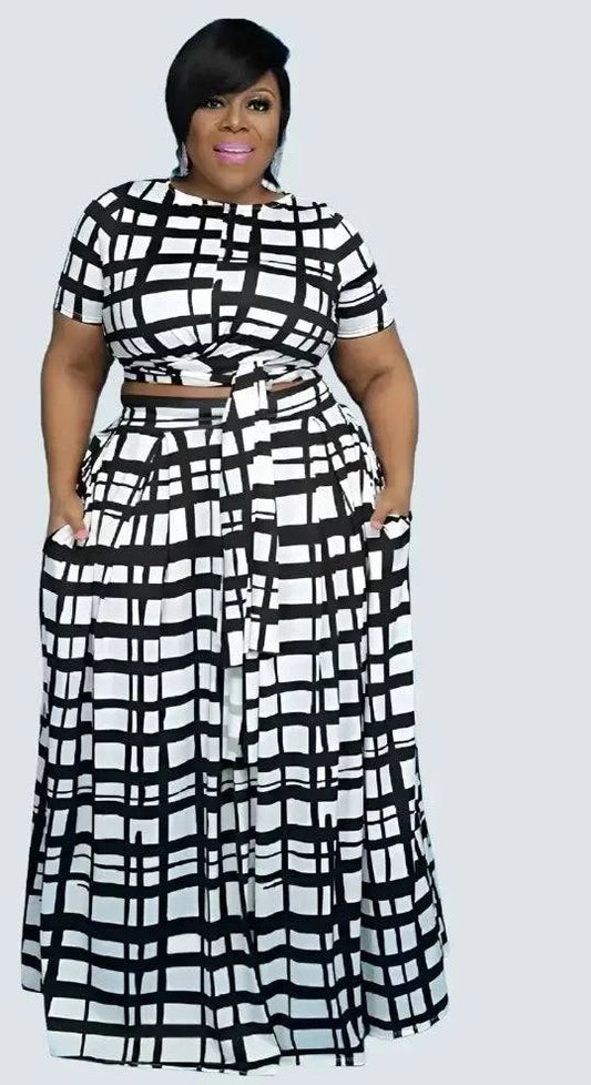 Plaid Two Piece Fashion Tie Up T-shirt and Maxi Skirts Matching Set FoElevate your style with this stunning Plaid Two Piece Matching Set for Women. Featuring a trendy tie-up t-shirt and a flowy maxi skirt, this set will have you channeDressPlush Fashions ShopPlush Fashion Shop