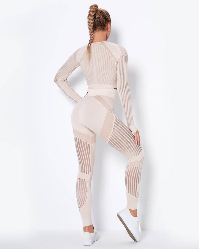 Seamless knitted absorbent yoga long-sleeved suit with stripe pattern and Lycra lining for flexibility and moisture-wicking.