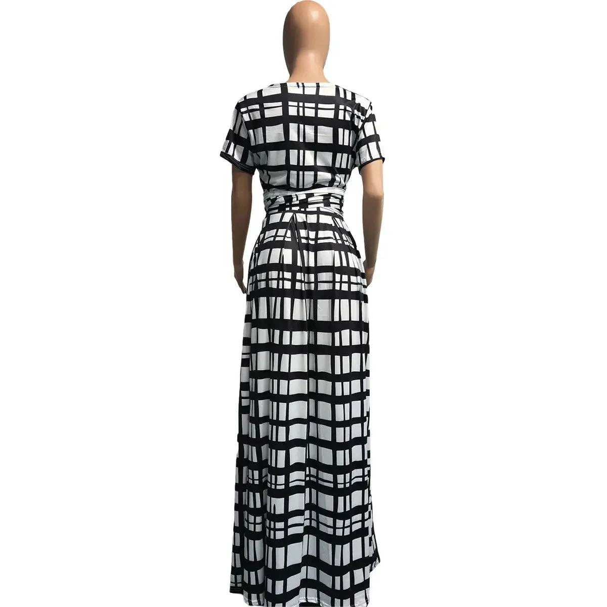 Plaid Two Piece Fashion Tie Up T-shirt and Maxi Skirts Matching Set FoElevate your style with this stunning Plaid Two Piece Matching Set for Women. Featuring a trendy tie-up t-shirt and a flowy maxi skirt, this set will have you channeDressPlush Fashions ShopPlush Fashion Shop