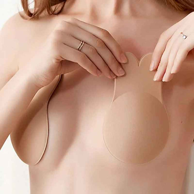 Silicone adhesive push-up bra with reusable breast lift tape for enhanced cleavage and comfort.