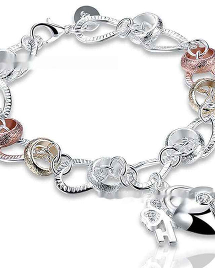 Silver Love Key Bracelet with romantic charm and retro design.