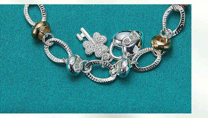 Silver Love Key Bracelet with retro ethnic design and love-shaped charm.