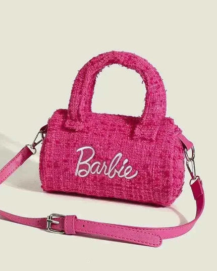 Women Fashion Pillow Barbie Hand Bag in pink, cylindrical shape with a scent feature, perfect for style-conscious women.