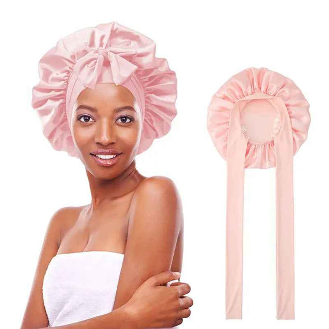 Women's double layered silk bonnet with elastic tie band for hair protection.