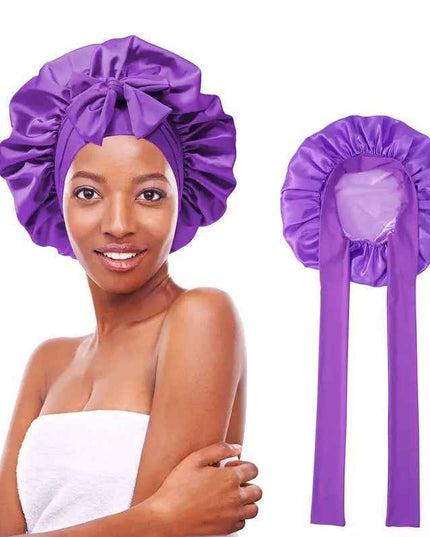 Women's double layered silk bonnet for hair care and sleep with elastic tie band.