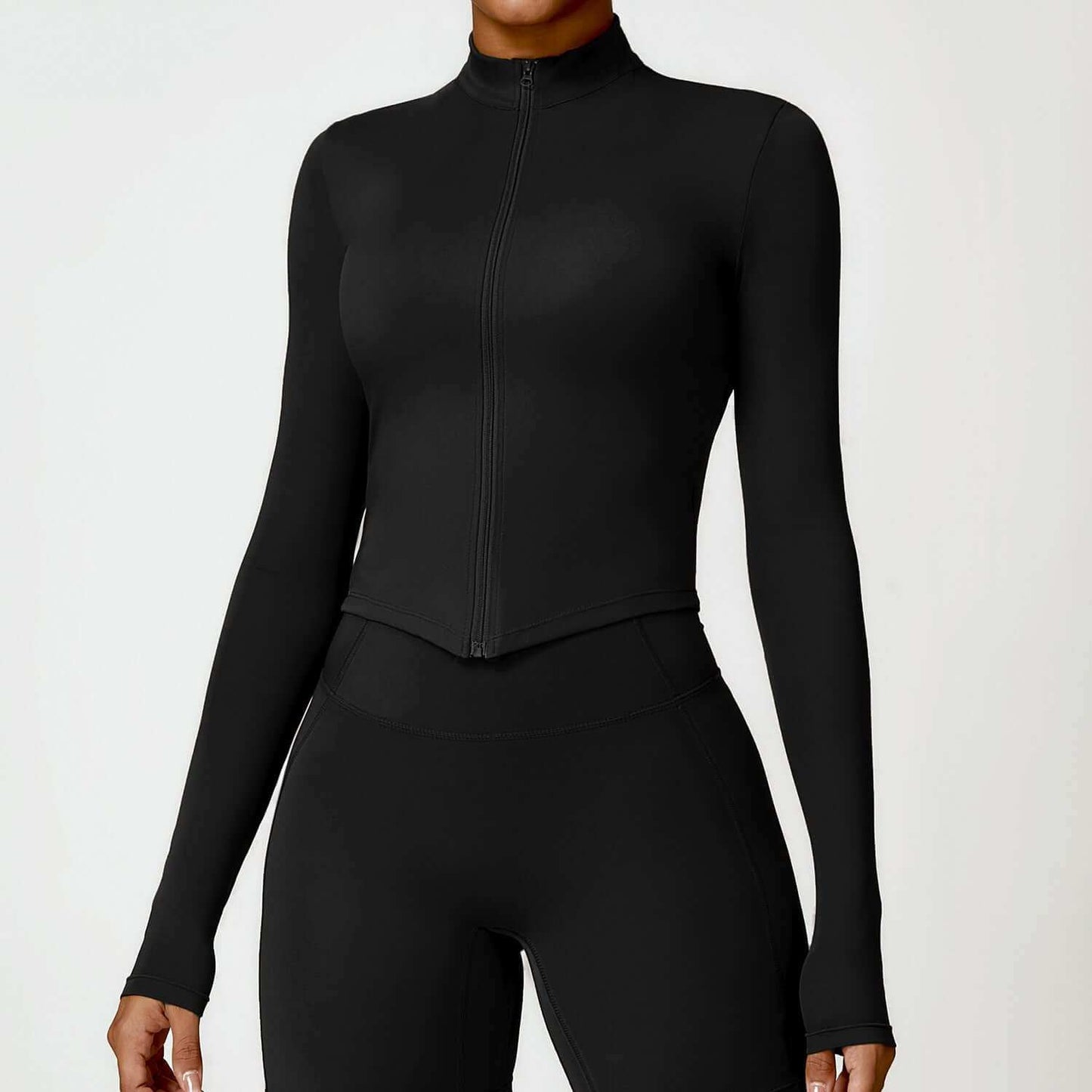 Women's tight long sleeve yoga wear in black, nylon fabric, available in sizes S to XL.