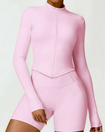 Women's tight long sleeve yoga wear in cherry blossom powder color.