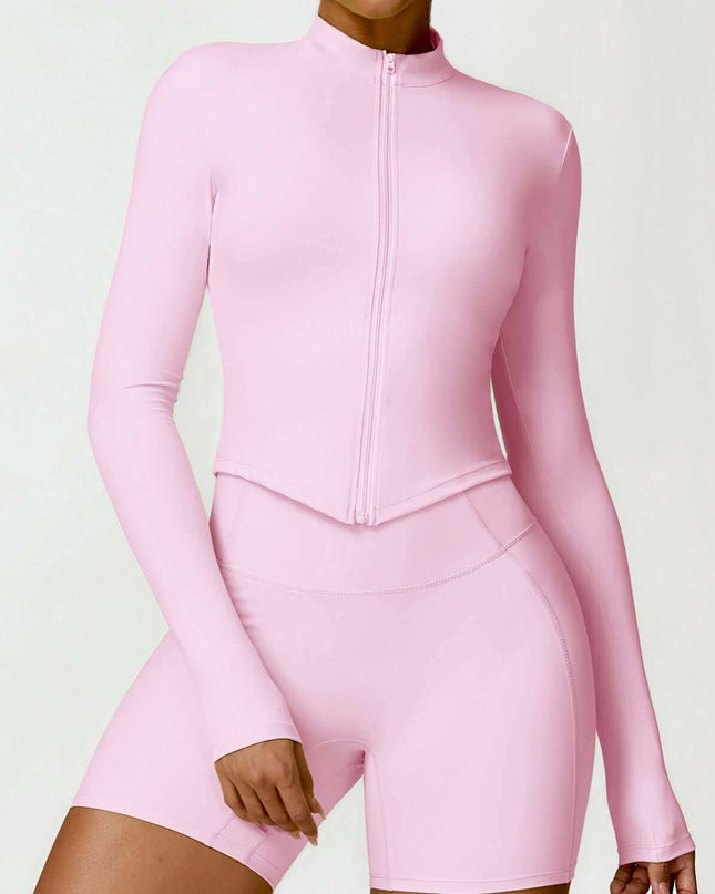 Women's tight long sleeve yoga wear in cherry blossom powder color.