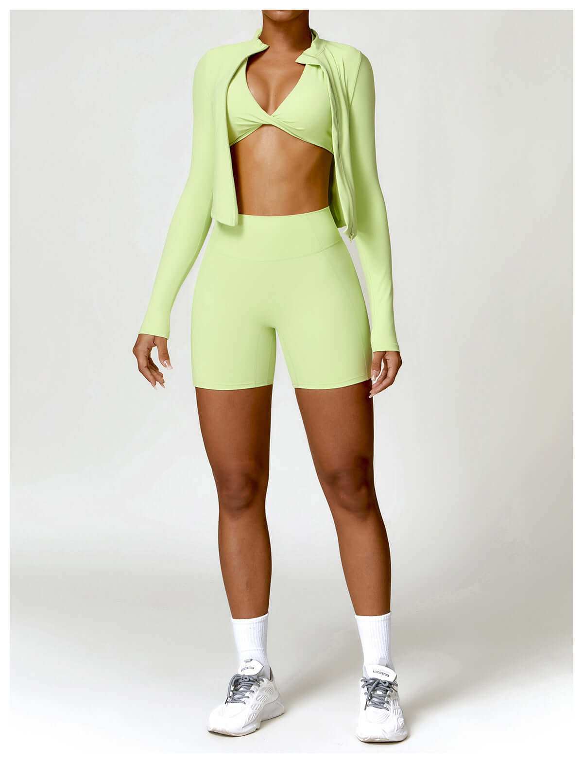 Women's tight long sleeve yoga wear in chartreuse, made of high-quality nylon for comfort and support.