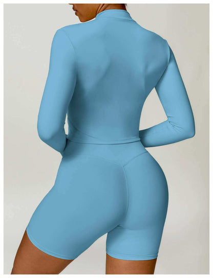 Women's tight long sleeve yoga wear in cloudy blue, comfortable Nylon fabric.