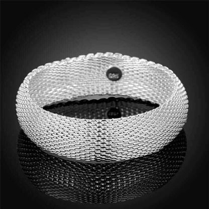 Women's silver mesh bracelet with unique design and silver plating.