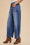 Annie Wear Mid Rise Barrel Leg Jeans with Pockets, showcasing flattering silhouette and comfort.