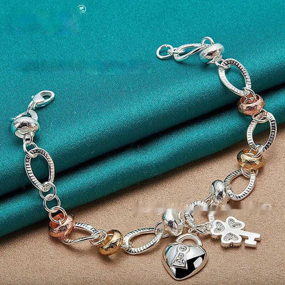 Silver Love Key Bracelet Female JewelryUnlock your style with our Silver Love Key Bracelet! Its retro, ethnic design is perfect for adding a touch of uniqueness to any outfit. The metal material ensures dJewelryPlush Fashions ShopPlush Fashion Shop