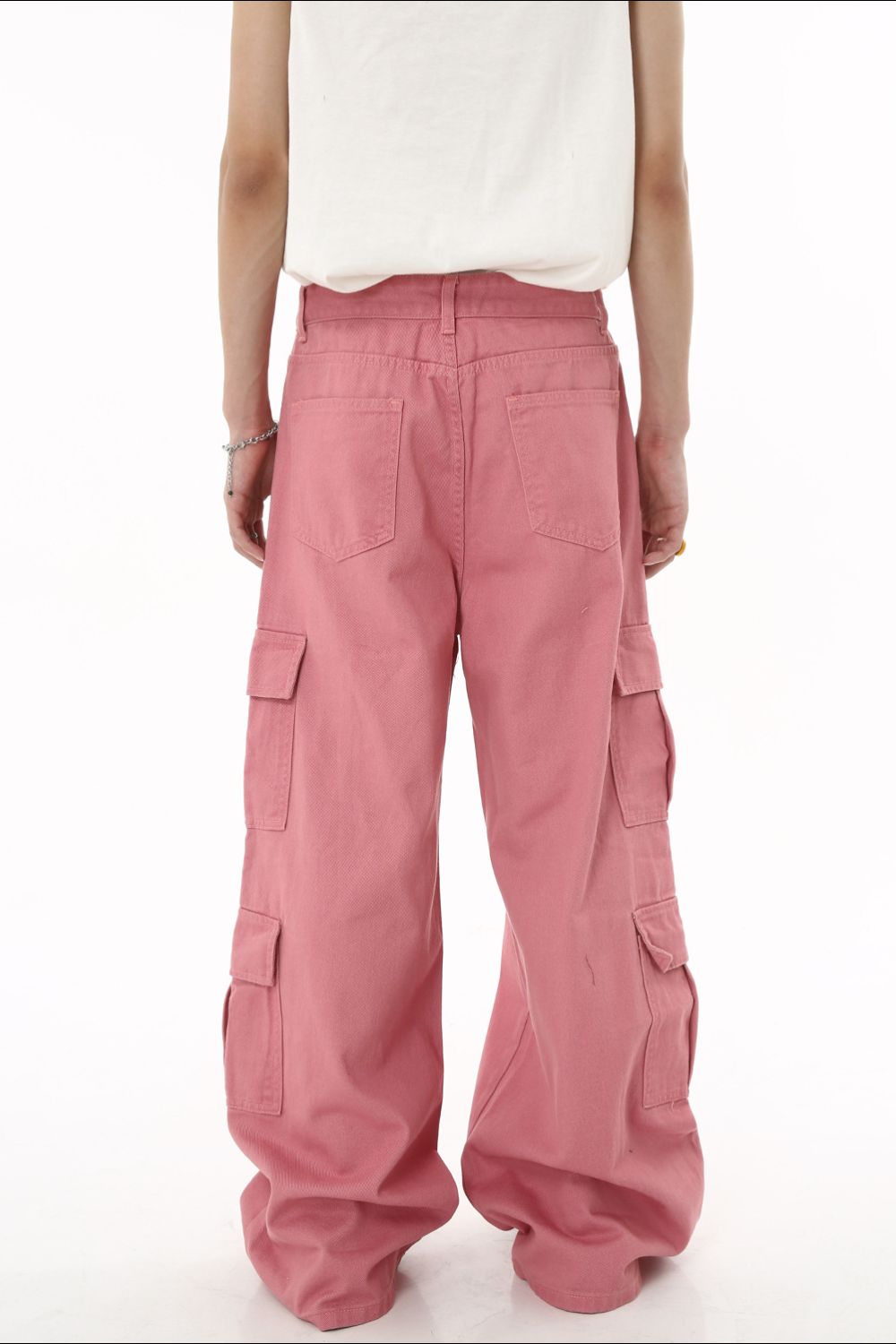 Wide leg cargo jeans in pink with utility pockets, back view.