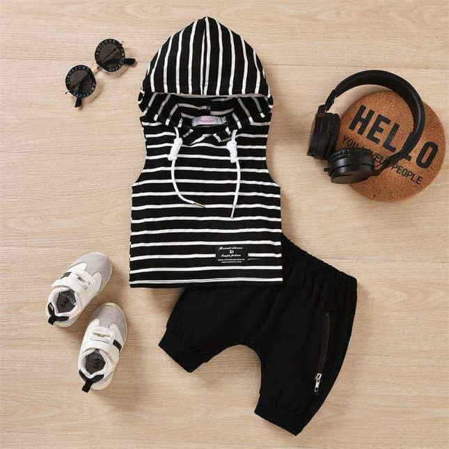 Boys' hooded striped tank top pants set with shoes and headphones on a wooden floor.