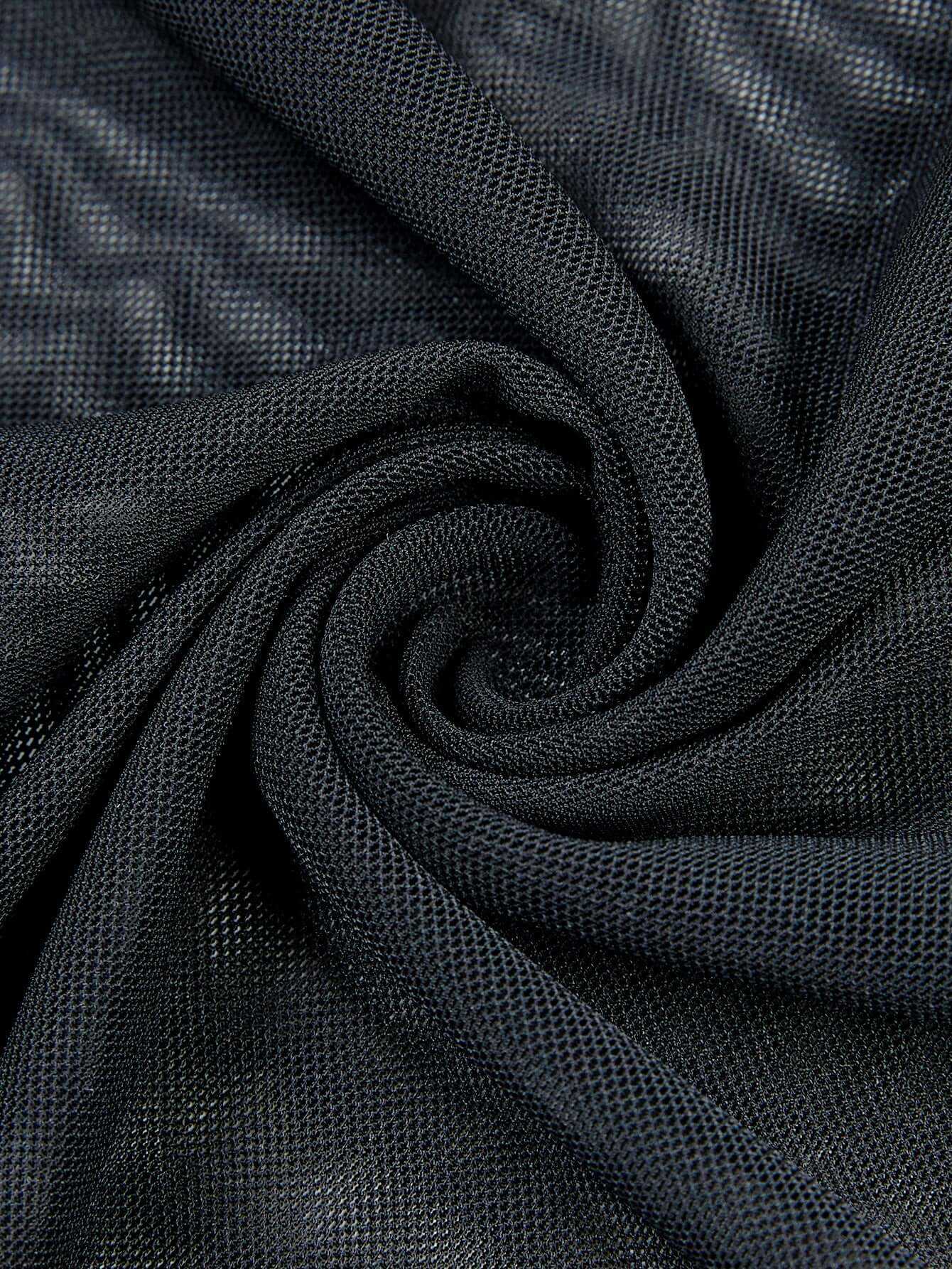 Close-up of breathable mesh fabric in black, highlighting stretch and quality.