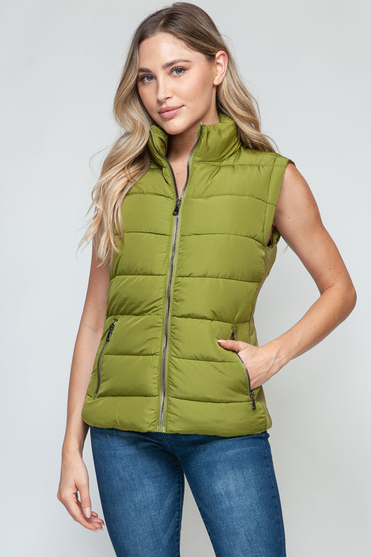 Snobbish Zip Up Turtleneck Vest with PocketsComplete your wardrobe with our Snobbish Zip Up Turtleneck Vest! With a stylish zip-up front and cozy turtleneck, this vest offers both fashion and warmth. The additCoatsPlush Fashion ShopPlush Fashion ShopSnobbish Zip