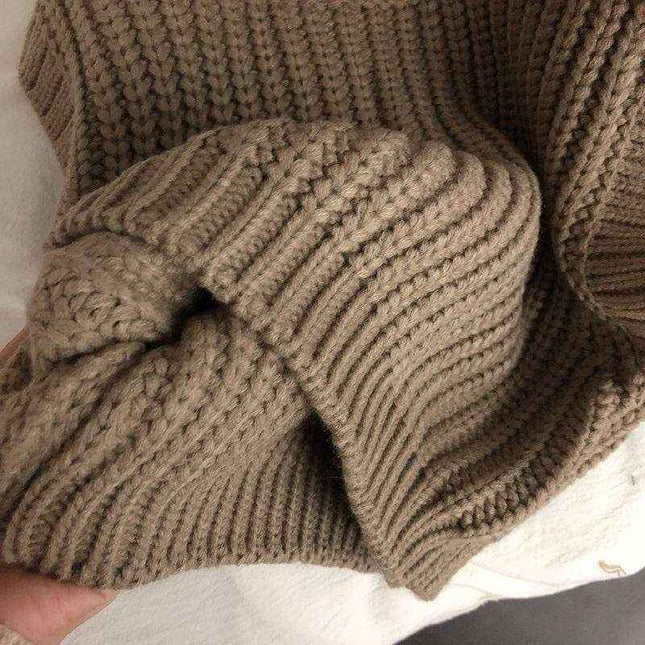 Children's thick stripe wool pullover sweater in beige.