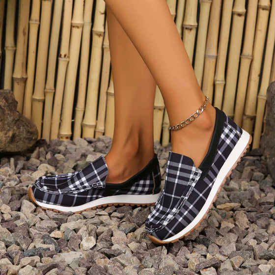 Plaid Round Toe Slip-OnsStep into comfort and style with our Plaid Round Toe Slip-Ons! Made with durable elastomer and soft polyester material, these flats provide all-day support and a snuShoesPlush Fashion ShopPlush Fashion ShopPlaid Round Toe Slip-Ons