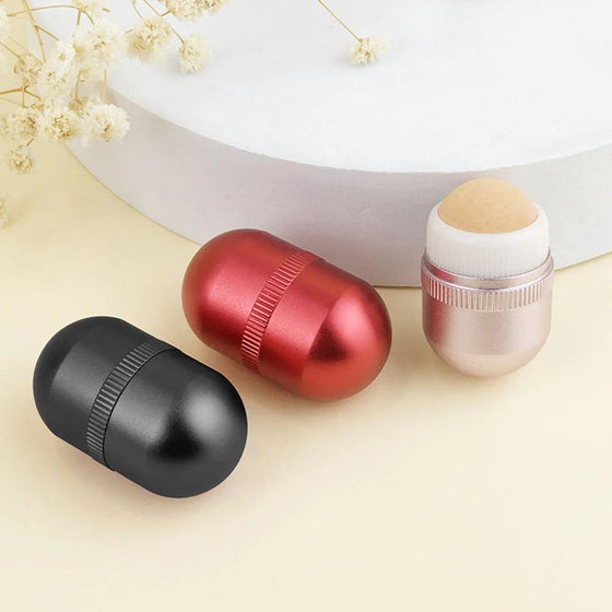 Oil Absorbing Roller with Natural Volcanic Stone for T-Zone control in black, red, and rose gold.