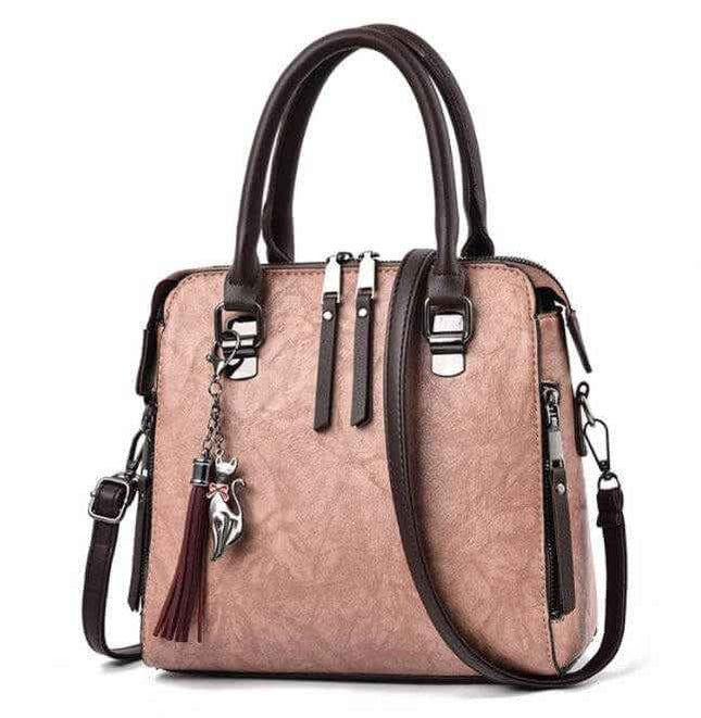 Ladies luxury handbags with adjustable crossbody strap, soft surface, and zipper closure.