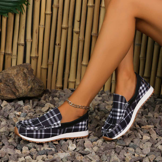 Plaid Round Toe Slip-OnsStep into comfort and style with our Plaid Round Toe Slip-Ons! Made with durable elastomer and soft polyester material, these flats provide all-day support and a snuShoesPlush Fashion ShopPlush Fashion ShopPlaid Round Toe Slip-Ons