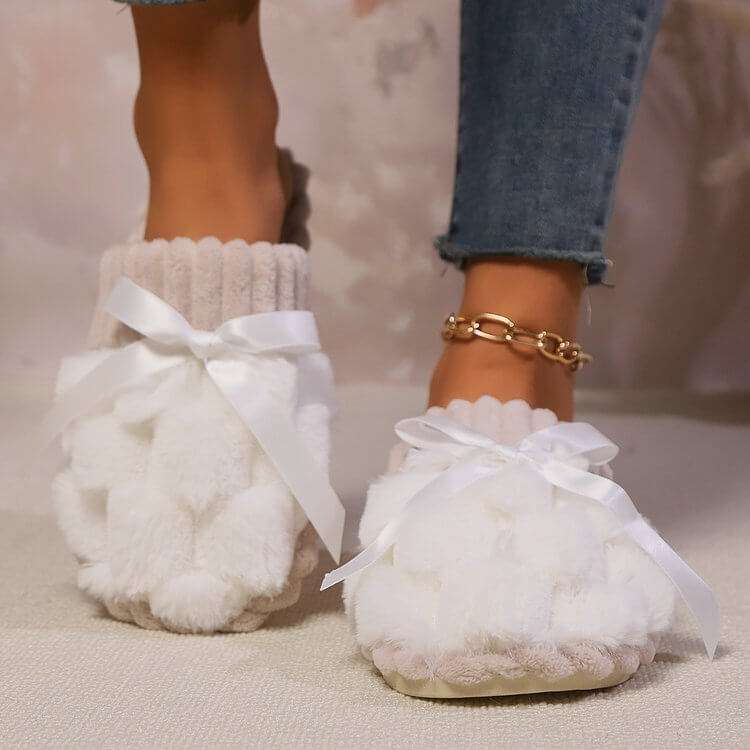 Bow Trim Contrast Slippers with white bow and textured material.