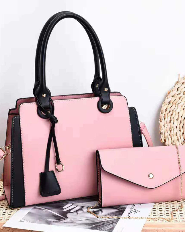 Women's fashion handbags in pink PU leather with black accents and shoulder strap.