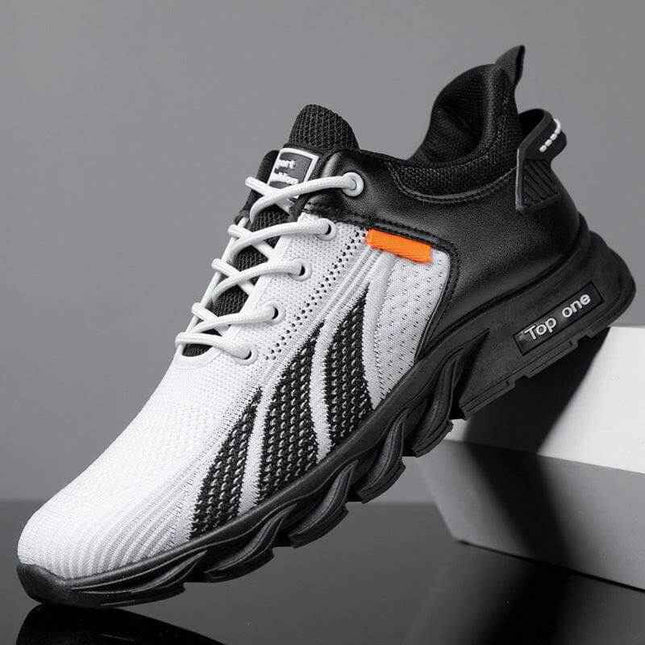 Men's mesh shoes with black and white color-block design, fly knit material, and lace-up closure for athletic style.