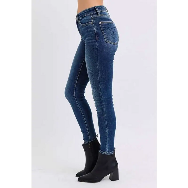 Judy Blue Blue Denim Skinny Jeans in a plush fashion shop with thermal lining