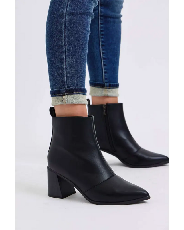 Black leather ankle boots styled with Judy Blue denim skinny jeans from Plush Fashion Shop