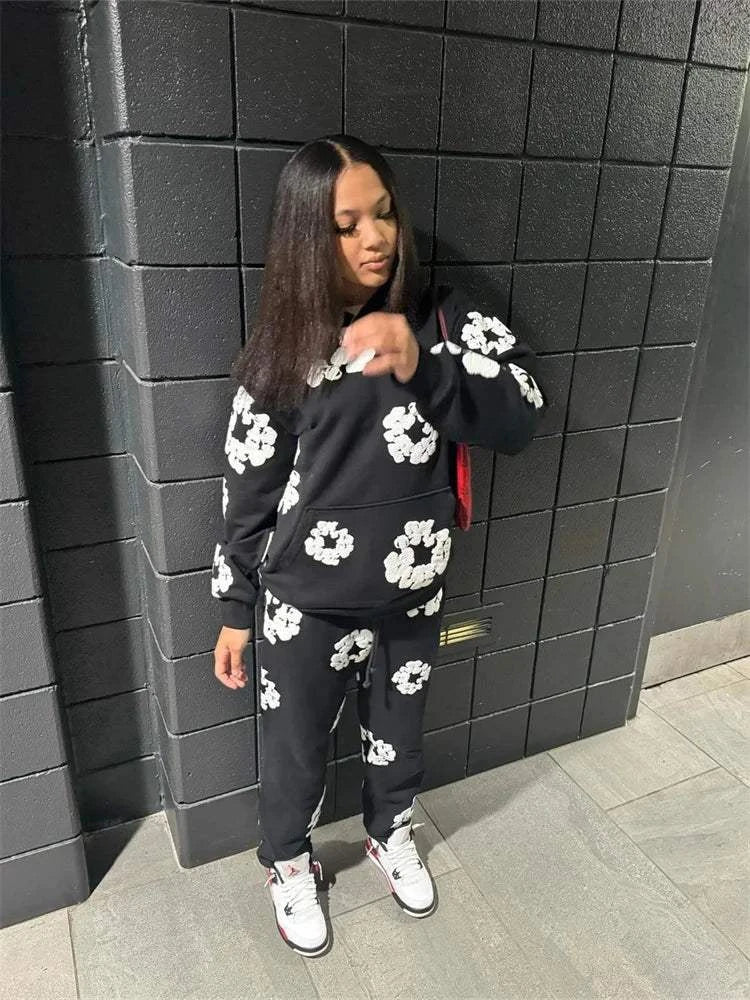 Women's Two Piece Hoodies Fashion Long Sleeve Elastic Waist SetsEnhance your style with our Women's Hoodie and Pants Set! Perfect for any occasion, this fashionable duo elevates your look with its long sleeve hoodie and elastic wSweatsuitPlush Fashions Shop Plush Fashion Shop